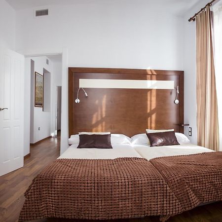 Apartamentos Casa De La Lonja Granada Room photo