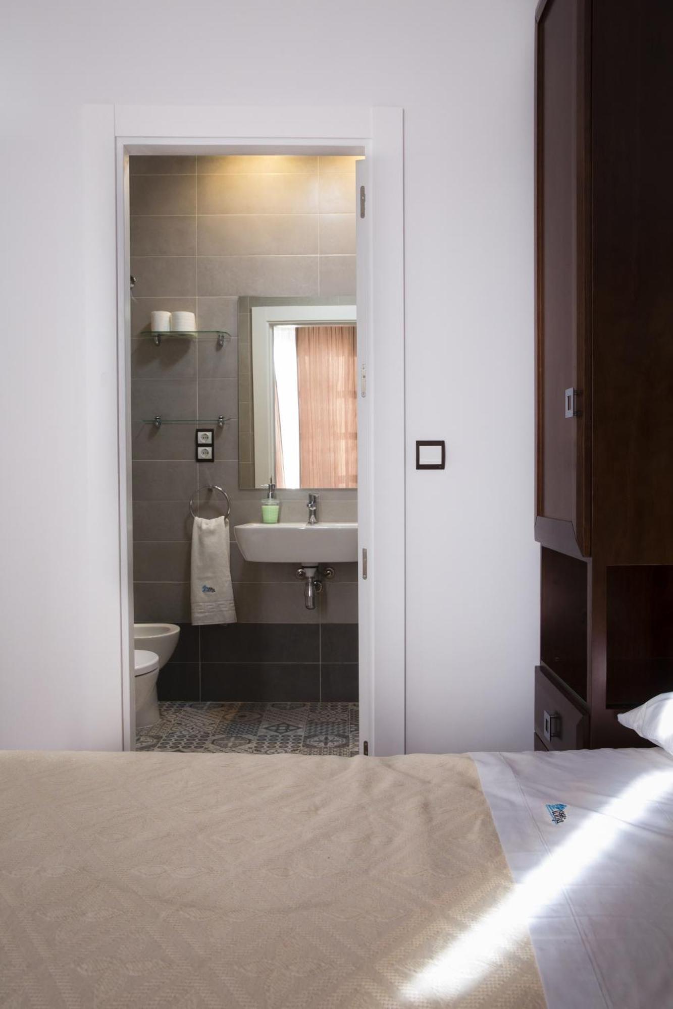 Apartamentos Casa De La Lonja Granada Room photo